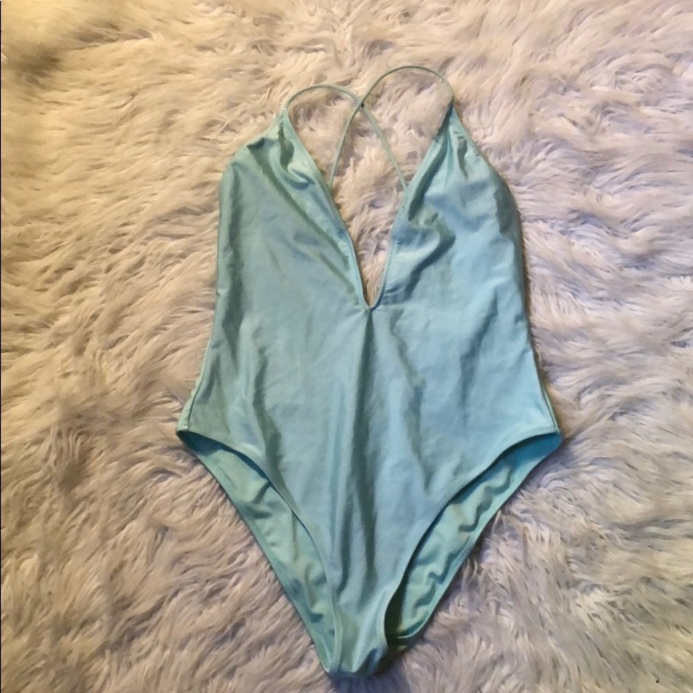 Low V cut bag blue one piece swim